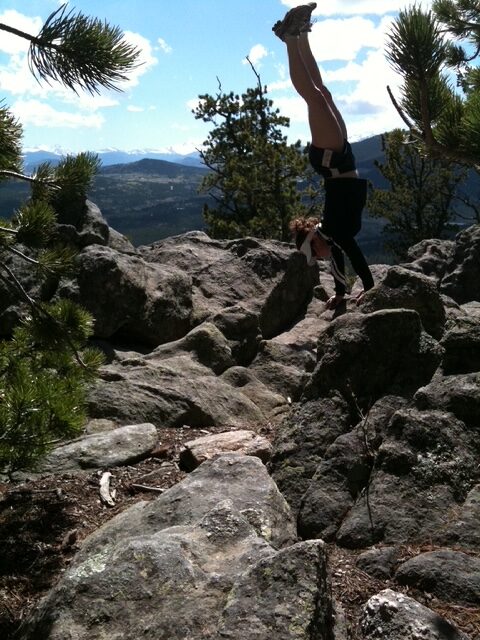 handstand on mountain
